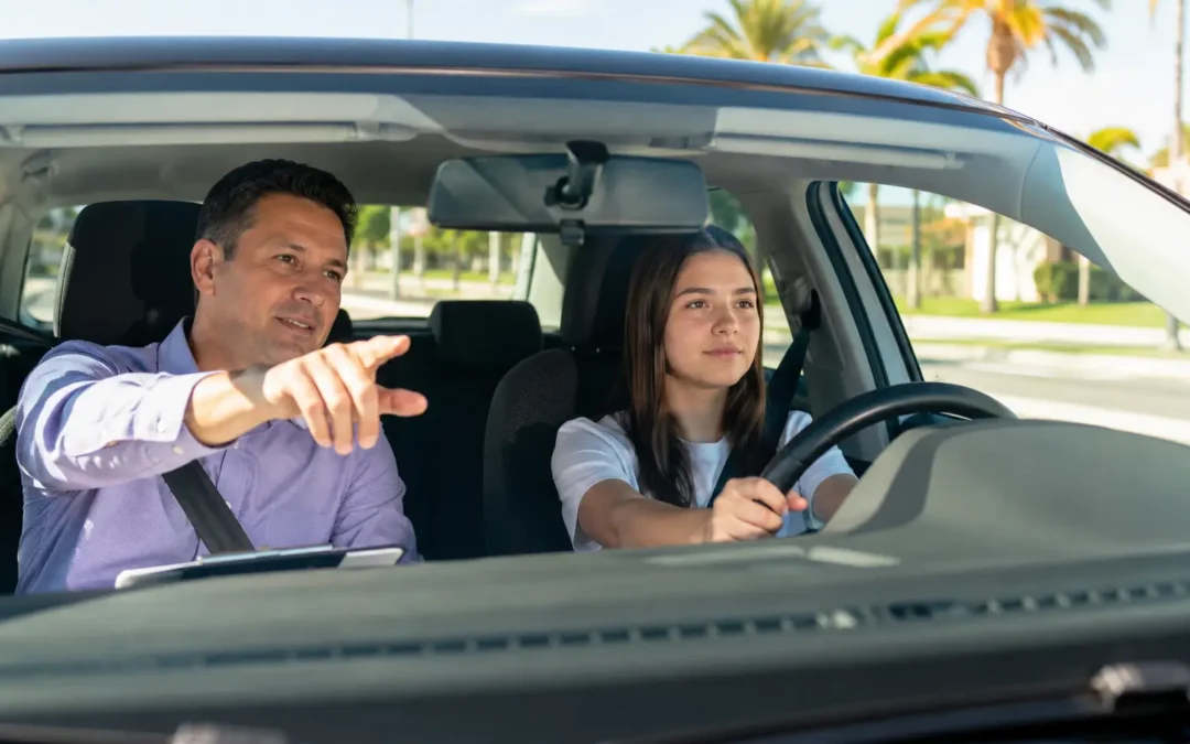 Student driver practices with an instructor inside a car on a sunny Florida road, building confidence during a professional driving lesson.